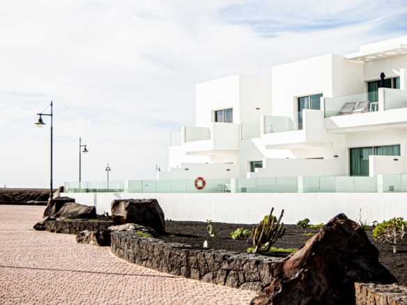 Modern beachfront apartments in Lanzarote, white architecture with ocean views in the best location in Lanzarote